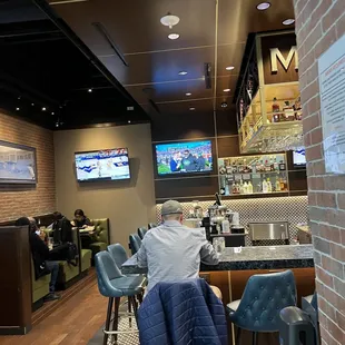 a man sitting at the bar