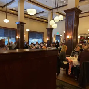 Restaurant is packed! Booths are separated by acrylic sheet.