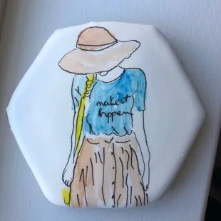 a woman in a hat and dress