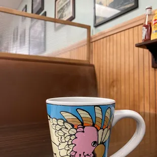 They even carry their logo into their coffee mugs!