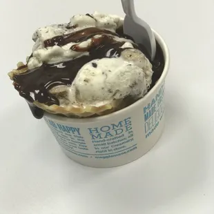 Waffle bowl with sweet cream ice cream, cookie dough and Oreos with some hot fudge to top off