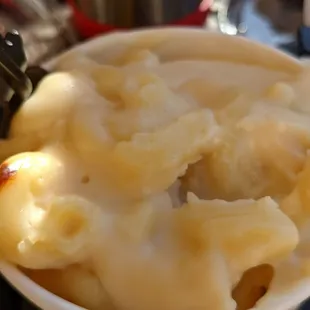 Mac n cheese side, slightly gritty and not that flavorful