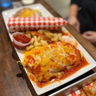 Chile Relleno Omelette with hot flour tortillas, potatoes, and refried beans