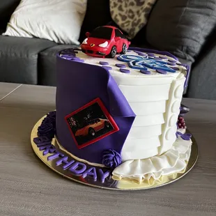 a cake with a car on top