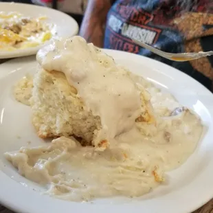 a piece of cake with icing on a plate