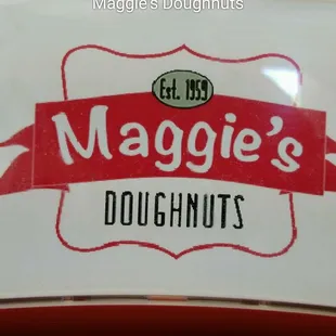 a close up of a doughnut box