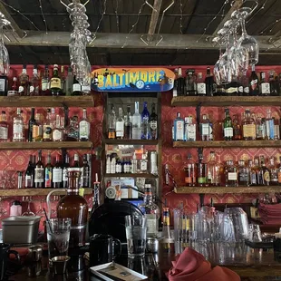 shelves of liquor and glasses