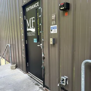 Entrance in rear of building