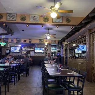 Plenty of seating and TVs throughout the restaurant...