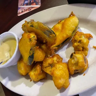 Appetizers which included mushrooms, cauliflower and zucchini with a tasty sauce...