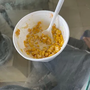 Corn in the cup halfway gone