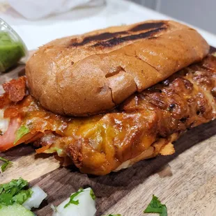Torta al Pastor.  Look at that cheese skirt!