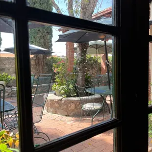 Sitting inside looking at the outdoor dining area.