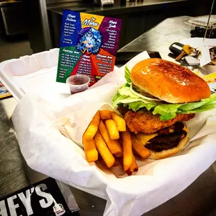 a burger and fries in a basket