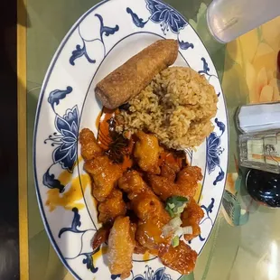 Orange chicken, fried rice, and an egg roll.