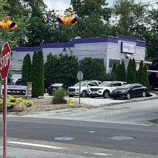 Outside of the building &amp; one parking area