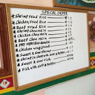 a menu on a white board