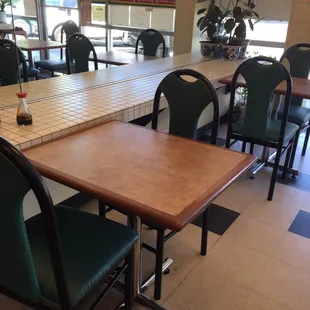 a table and chairs in a restaurant