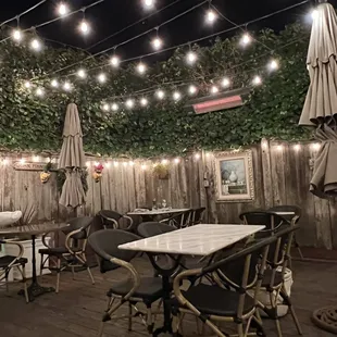 Such a sweet patio...With heat lamps too!