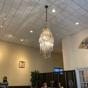 a chandelier hanging from the ceiling