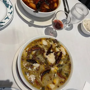 Two spicy fish dishes. One simple chili, the other a sort of spicy Kim-chee flavor