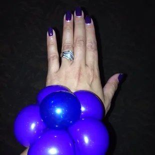 Got a ballon flower bracelet made at the show!