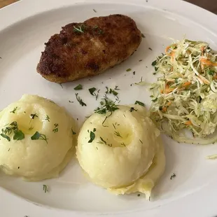 Pork cutlet with potatoes and salad
