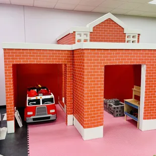 a fire truck in a garage