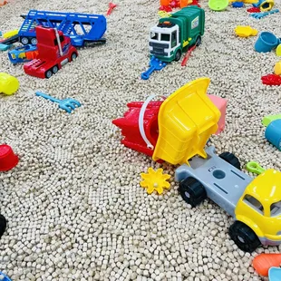 a pile of toys on the floor