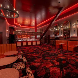 a bar with red lighting