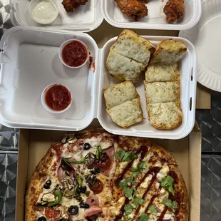 1/2 Supreme 1/2 bbq pizza, cheesy garlic bread, 1/2 hot wings, 1/2 mild wings