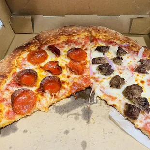 Build your own pizza. Left half pepperoni and right half  ground beef and onion.