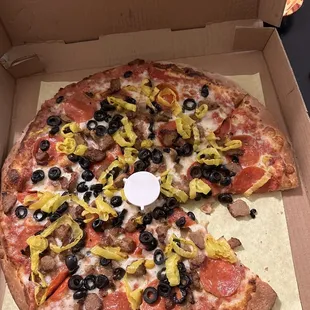 Pepperoni, sausage, olives, banana peppers  couldn't resist the smell on the ride home