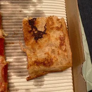 Underside of the GF pizza.