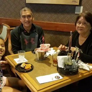 Waiting for the show to start. Munching on some pupus.