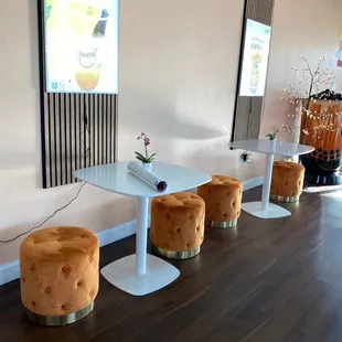 a row of stools in a coffee shop