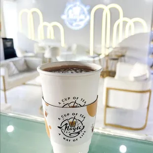 a cup of coffee on a table