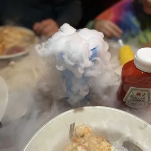 a plate of food with a smoke coming out of it