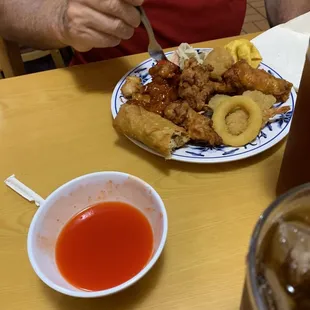 a man eating a plate of food
