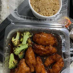 Orange chicken with broccoli and fried rice