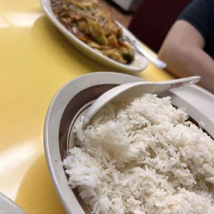 Huge bowl of white rice for the table.