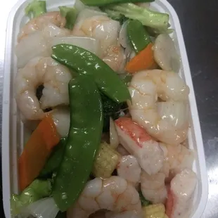 shrimp and vegetables in a container