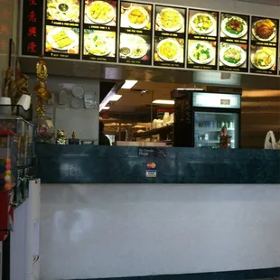 a restaurant counter with menus