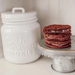 a stack of red velvet cookies