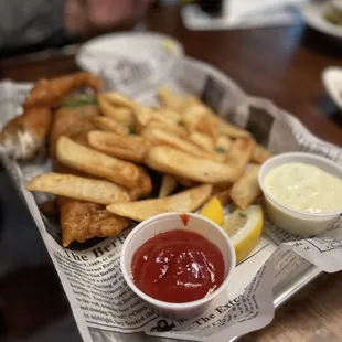 a tray of fries and ketchup