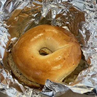 a bagel wrapped in foil