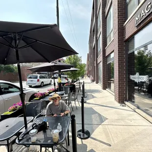 Outdoor seating with a water bowl for dogs