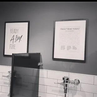 a black and white photograph of a bathroom