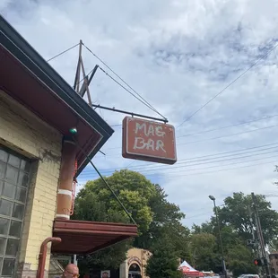 a man and a woman walking down the street