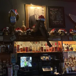 a man sitting on top of the bar